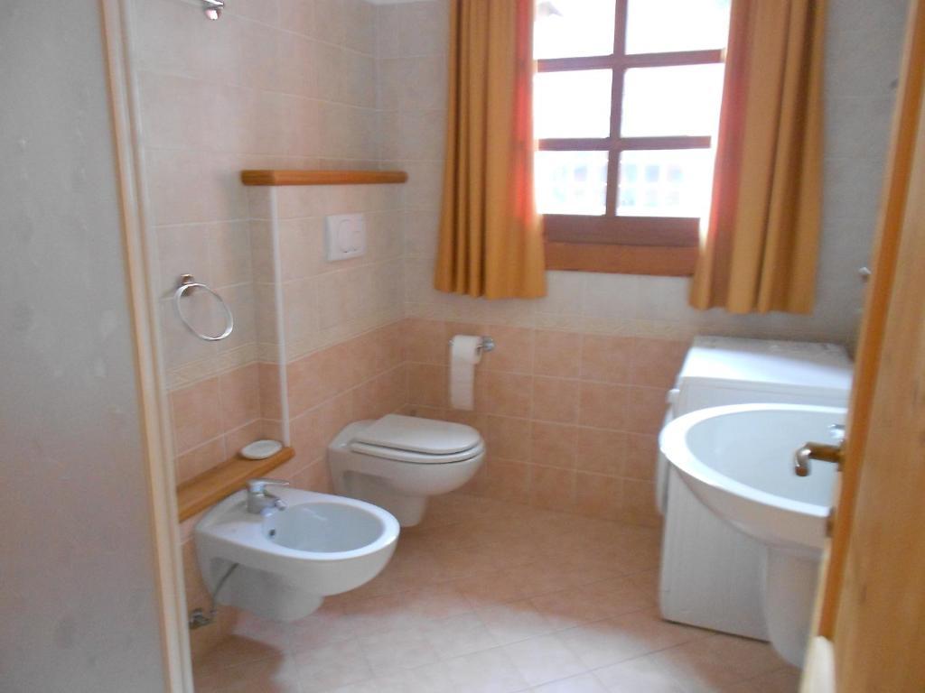 Residence Le Orchidee Bormio Rom bilde