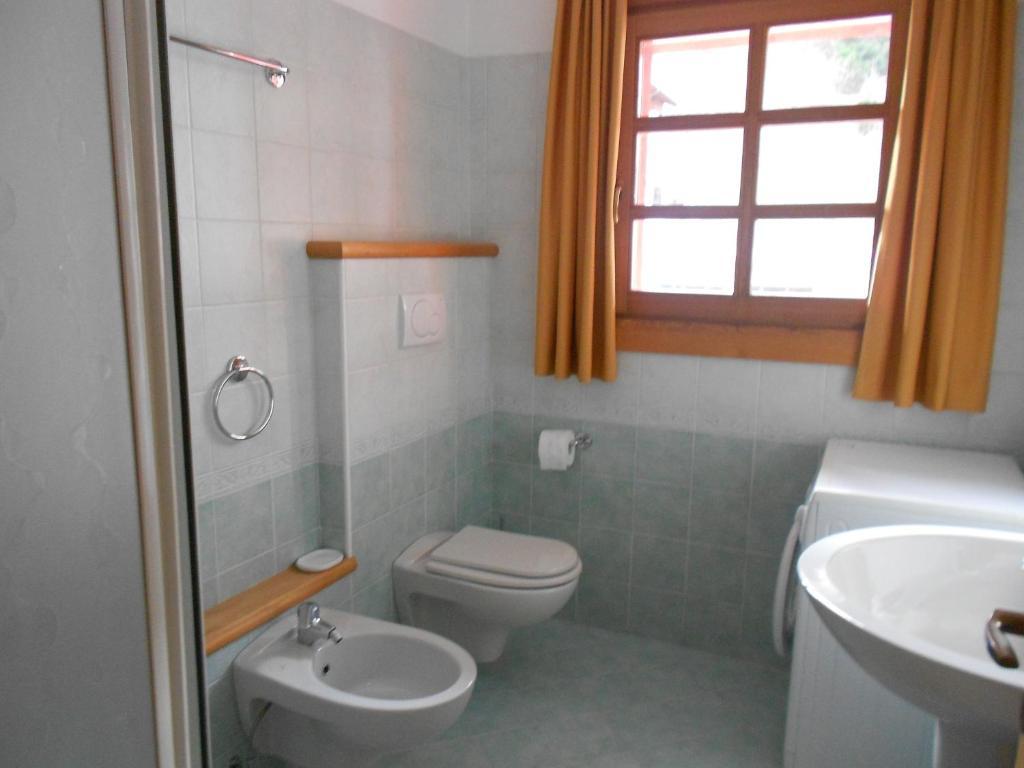 Residence Le Orchidee Bormio Rom bilde